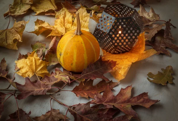 Pumpkins and candle — Stok fotoğraf