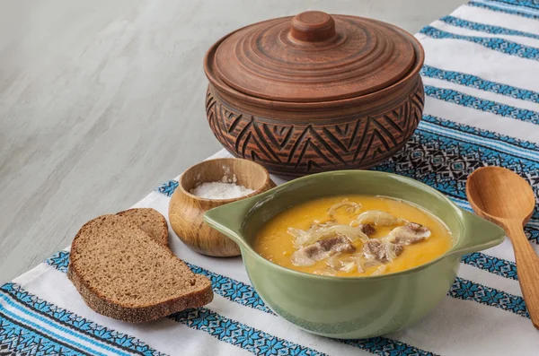 Pumpkin soup with fried onions and meat with bacon — Stock Photo, Image