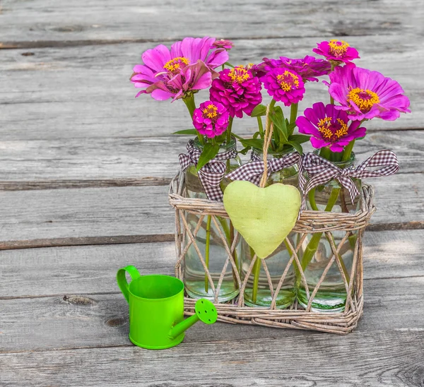 Bouquet with zinnia in basket — Stock Photo, Image
