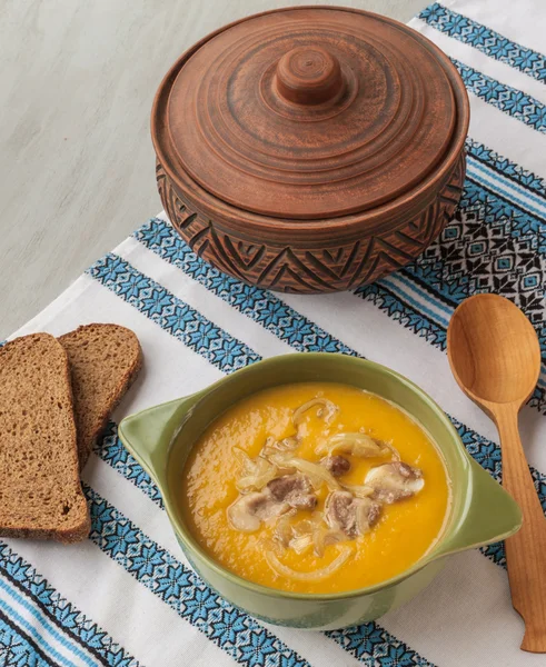 Pumpkin soup with fried onions and meat — Stock Photo, Image