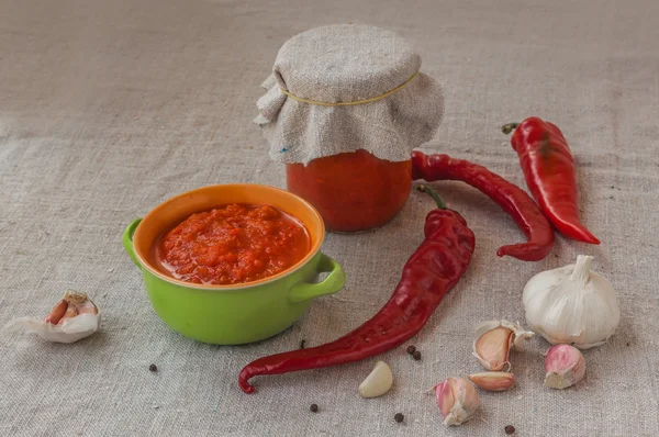 Homemade adjika and  hot pepper — Stock Photo, Image