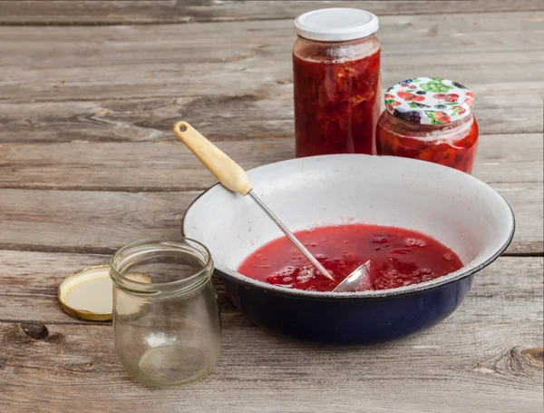 Plum jam and capacity for conservation — Stock Photo, Image