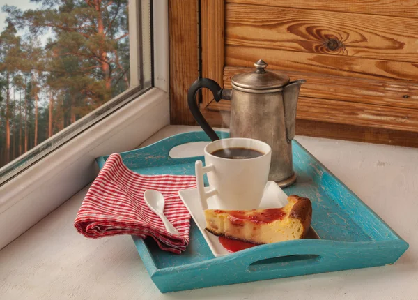 Cheesecake and coffee on a tray — Stock Photo, Image