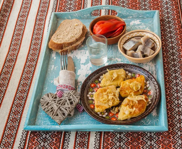 Rombos de patata con cebolla frita — Foto de Stock