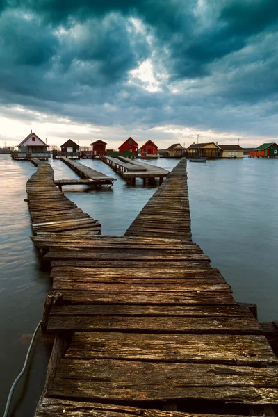 Sunset lake Bokod with pier — Stock Photo, Image