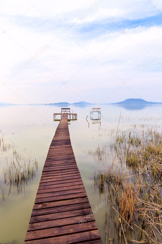 Wooden pier in tranquil lake Balaton