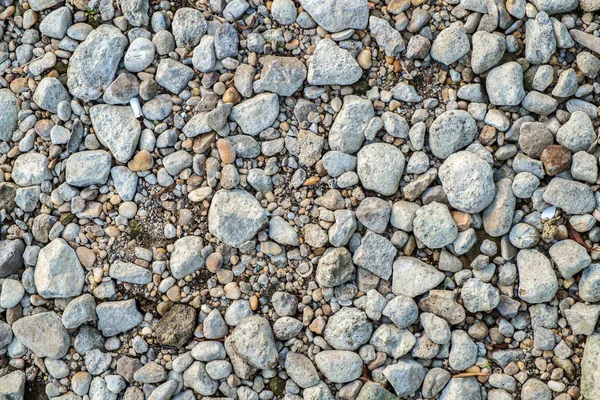 Kleine pebble rock achtergrondstructuur — Stockfoto