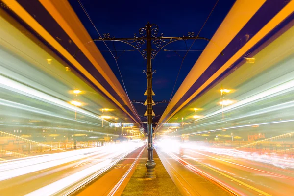 Blurred tram in Margeret bridge at night Budapest — Stock Photo, Image