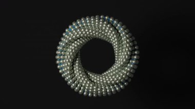 Koyu bir zemin üzerinde pürüzsüz dönen, devamlılığı, yapıyı ve dijital sistemleri temsil eden birçok küçük küreden oluşan beyaz bir torusun üç boyutlu soyut animasyonu.