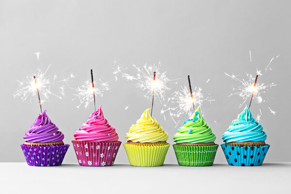 Colorful cupcakes with sparklers