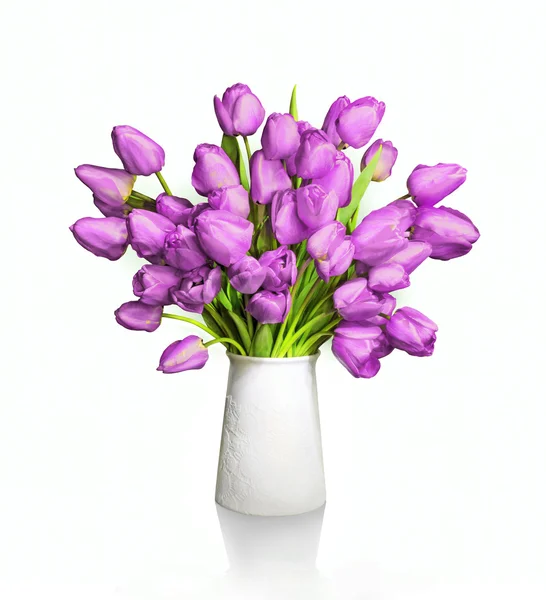 Bouquet of red tulips in white vase — Stock Photo, Image