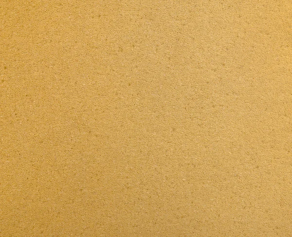 Oranje schuimrubber textuur achtergrond — Stockfoto