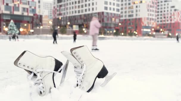 Old White Ice Skates Putting Snow Public Ice Skating Rink — Stock Video