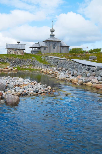 The wooden church on the shore — Stock Photo, Image