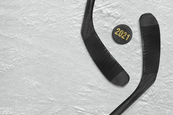 Hockey accessories lying on the ice arena. Hockey season, concept