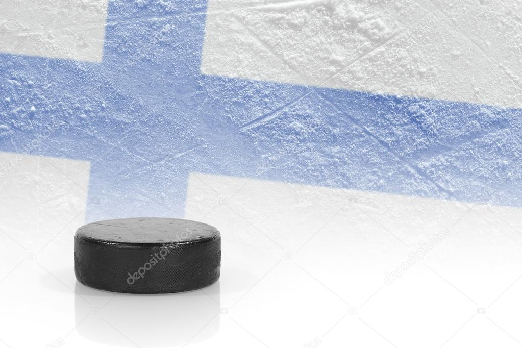 Hockey puck and the Finnish flag 