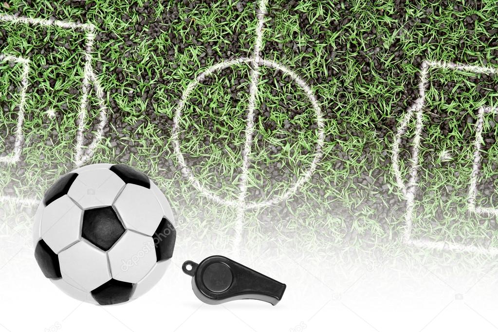 Football pitch, the ball and the referee's whistle