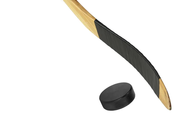 Hockey puck och klubba — Stockfoto