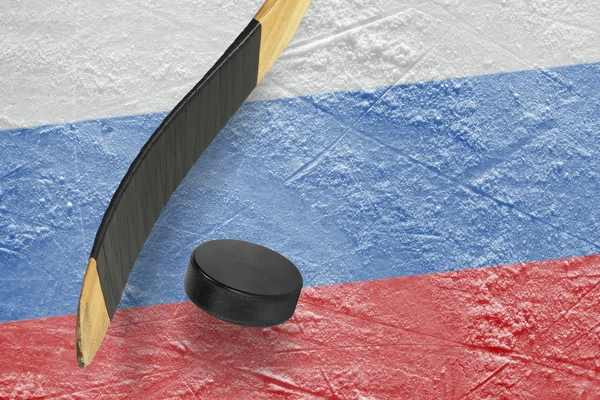 Hockey puck and stick — Stock Photo, Image