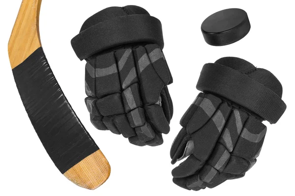 Hockey handschoenen, stok en puck — Stockfoto