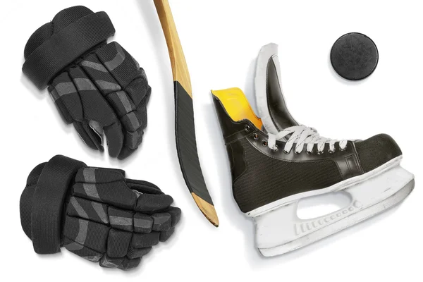 Hockey schaatsen, stick, handschoenen en puck — Stockfoto