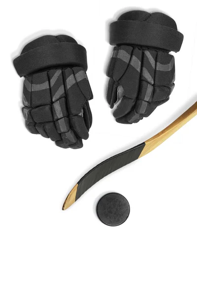Bâton de hockey, gants et rondelle — Photo