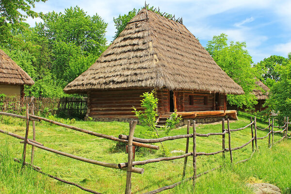Old wooden house in museum of Folk Architecture in Uzhhorod, Ukraine