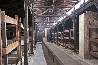 Inside of barrack in concentration camp Auschwitz, Brzezinka, Poland. 1.1 million people mostly Jews from allover Europe were killed in gas chambers clipart