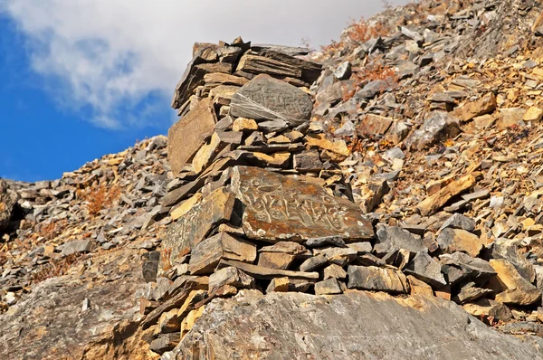 Zen rock arrangement that mimic the Stupa along hiking trail to the mountains of Annapurna, Nepal