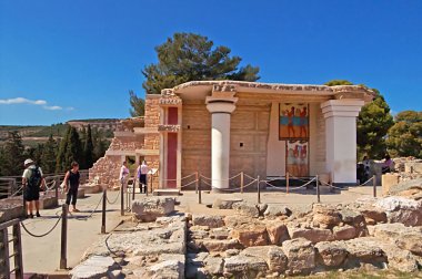 Unidentified tourists near South Propylaeon at the Knossos palace on the Crete island in Greece. Knossos is the largest Bronze Age archaeological site on Crete and is Europe's oldest city clipart