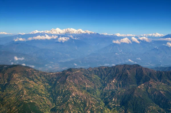 Krajina v horách Himálaje z letadla, Nepál — Stock fotografie