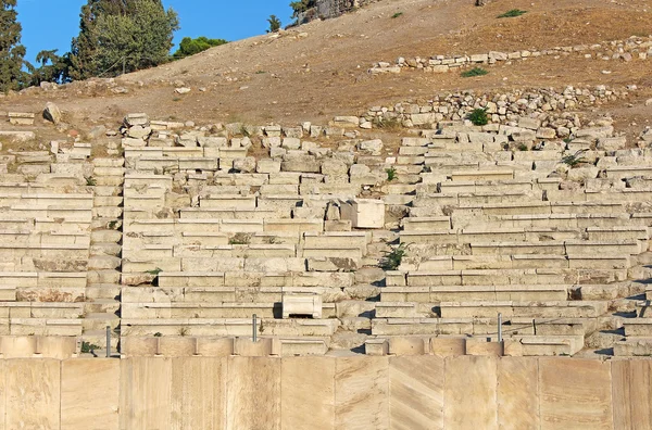 Křesla v divadle Dionýsa na Akropolis v Athénách, Řecko — Stock fotografie