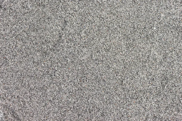 Atlantik Okyanusu kıyısında kum. Üst görünüm, kapat