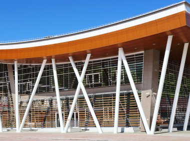 Front of large building with steel constructions