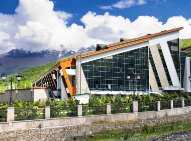 Modern building in a futuristic style with glass panel