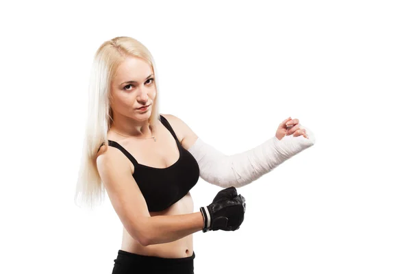 Fitness fille avec un bras cassé — Photo