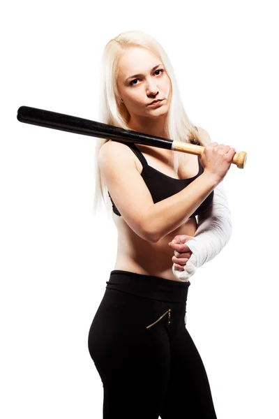 野球のバットを保持して骨折した腕を持つ少女 — ストック写真
