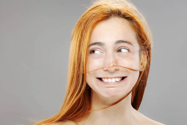 Happy Red Hair Girl Making Face Expressions Studio Portrait Gray — Stock Photo, Image