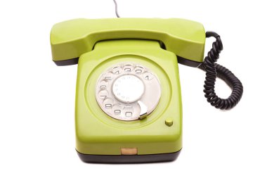 Beyaz arka planda yeşil telefon retro tarzı. Klasik telefon ahizesi alıcısı.