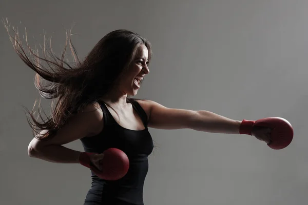 Girl Exercising Karate Punch Screaming Gray Background — Stock Photo, Image