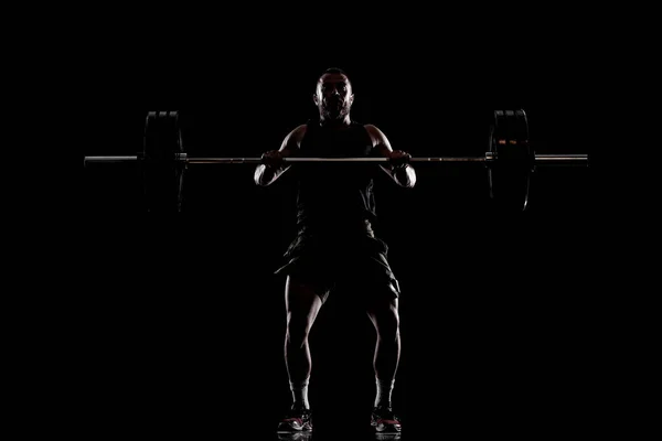 Atleta Levantando Barra Silueta Hombre Musculoso — Foto de Stock