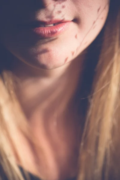 Close up portrait. Woman mouth with flower shadows. — Stock Photo, Image