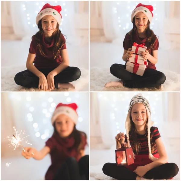 Kerstmis, kerst, winter, geluk concept - lachen meisje met geschenkdozen en sparkler — Stockfoto