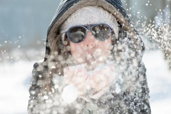 Winter Christmas Girl. Beautiful Woman Blowing Snow — Stock Photo, Image