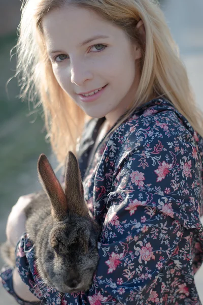 Girl holding easter bunny — Stock Photo, Image