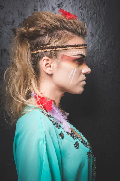 American Indian with paint face camouflage — Stock Photo, Image