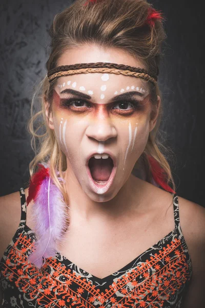 American Indian warrior with paint face — Stock Photo, Image