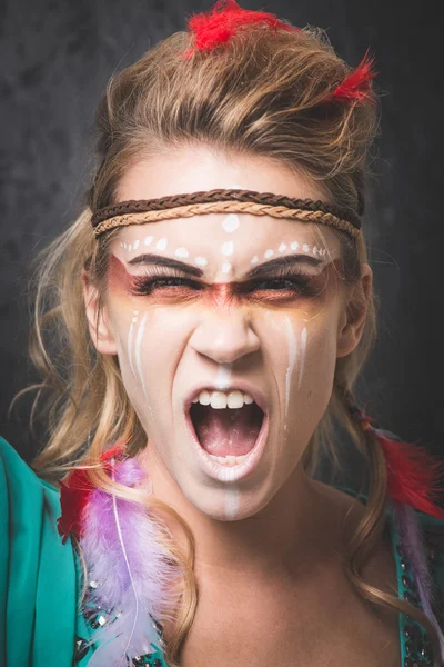 American Indian warrior with paint face — Stock Photo, Image
