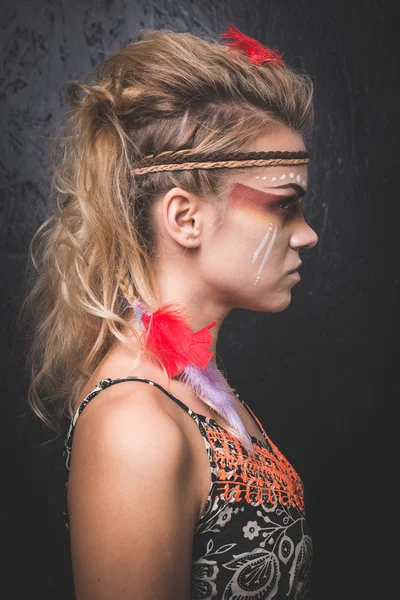 American Indian with paint face camouflage, side portrait - studio photo with professional makeup — Stock fotografie