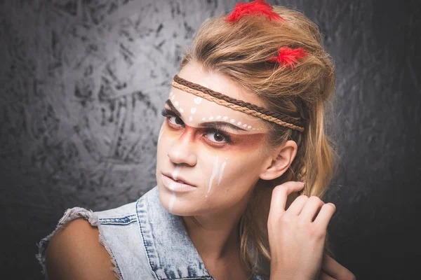 American Indian with paint face camouflage - studio photo with professional makeup — Stock Photo, Image